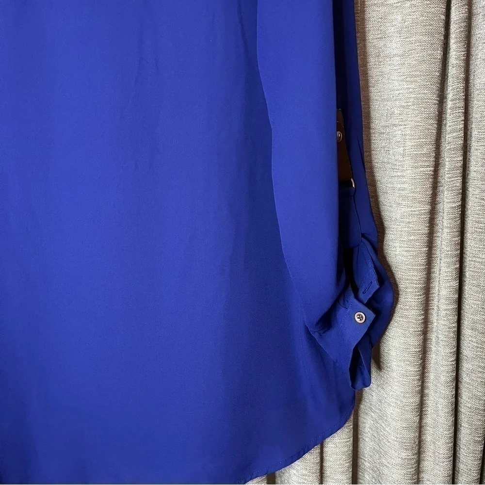 Zac & Rachel hold blouse